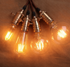 Żarówka dekoracyjna filament E27 G95 8W kula amber 2200K