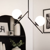 Nowoczesna lampa wisząca metalowa szklane kule Balts