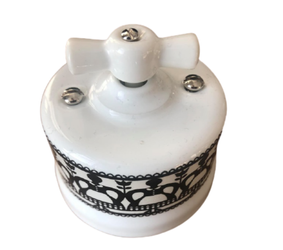 Włącznik ceramiczny obrotowy natynkowy krzyżowy biały ze zdobieniem FOLK